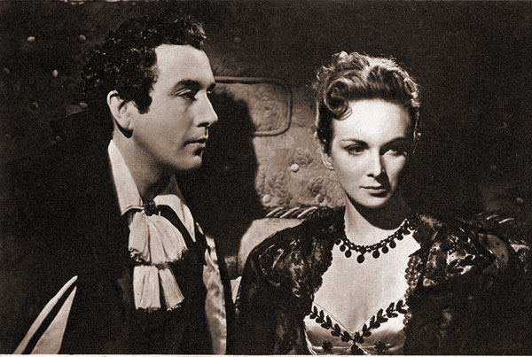 Dennis Price (as Lord Byron) and Joan Greenwood (as Lady Caroline Lamb) in a photograph from The Bad Lord Byron (1948) (7)