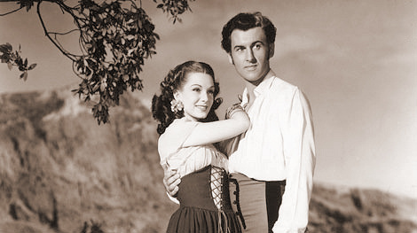 Jean Kent (as Rosal) and Stewart Granger (as Richard Darrell) in a photograph from Caravan (1946) (1)
