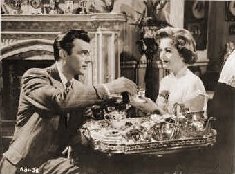 Dirk Bogarde (as Edward Bare) and Margaret Lockwood (as Freda Jeffries) in a photograph from Cast a Dark Shadow (1955) (1)