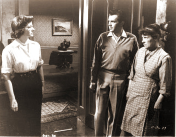 Margaret Lockwood (as Freda Jeffries), Dirk Bogarde (as Edward Bare) and Kathleen Harrison (as Emmie) in a photograph from Cast a Dark Shadow (1955) (12)