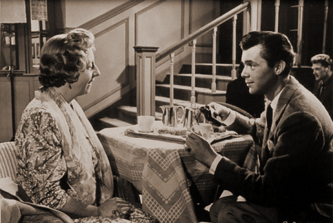 Mona Washbourne (as Monica Bare) and Dirk Bogarde (as Edward Bare) in a photograph from Cast a Dark Shadow (1955) (17)