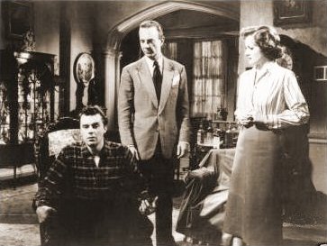 Dirk Bogarde (as Edward Bare), Robert Flemyng (as Phillip Mortimer) and Margaret Lockwood (as Freda Jeffries) in a photograph from Cast a Dark Shadow (1955) (5)