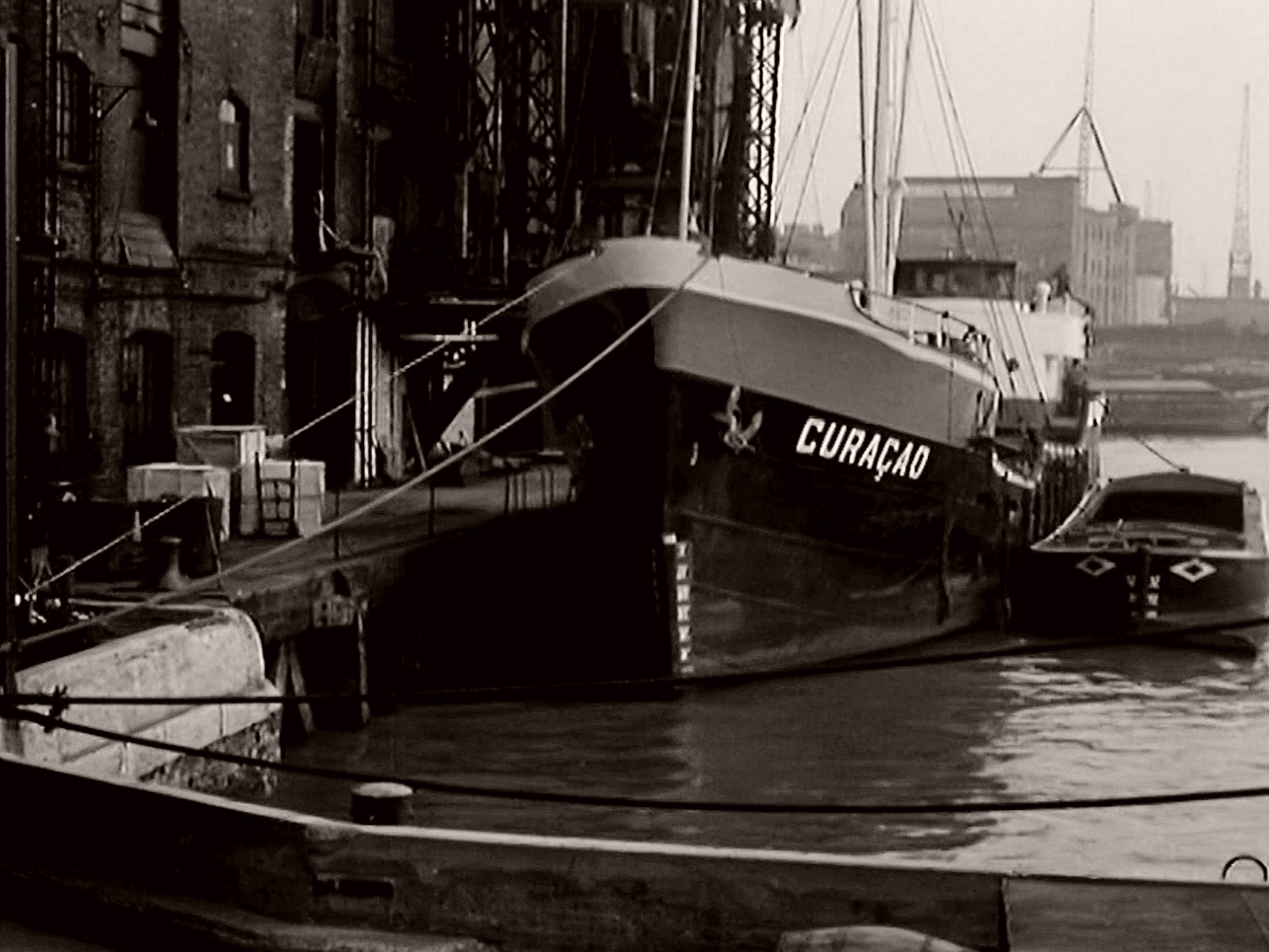 Screenshot from The Diplomatic Corpse (1958) (1) featuring the vessel ‘Curaçao’