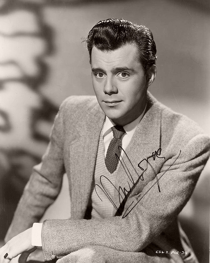Dirk Bogarde, British actor, in a signed publicity photograph