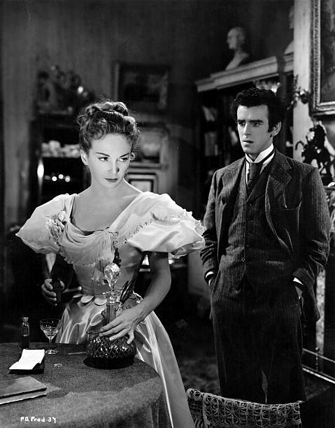 Joan Greenwood and George Cole share a scene in the film ’Flesh And Blood’, directed by Anthony Kimmins for British Lion
