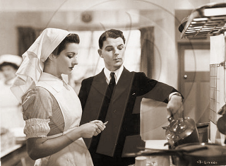Margaret Lockwood (as Nurse Anne Graham) and Emlyn Williams (as Tracy) in a photograph from The Girl in the News (1940) (13)
