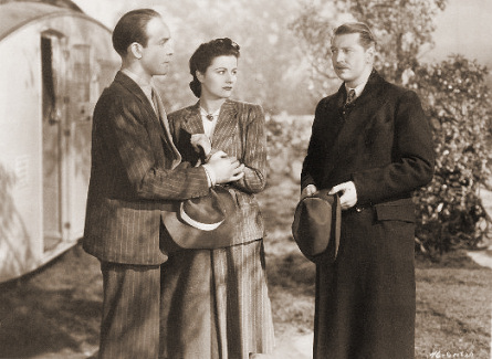 Barry K Barnes (as Stephen Faringdon), Margaret Lockwood (as Nurse Anne Graham) and Roger Livesey (as Bill Mather) in a photograph from The Girl in the News (1940) (9)