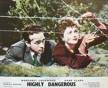 Margaret Lockwood (as Frances Gray) and Dane Clark (as Bill Casey) in a lobby card from Highly Dangerous (1950) (7)