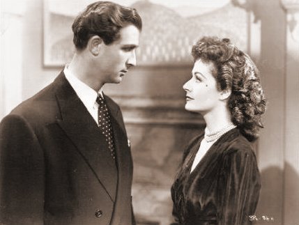 Norman Wooland (as Ashley Morehouse) and Margaret Lockwood (as Ann Markham) in a photograph from Look Before You Love (1948) (11)