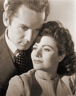Griffith Jones (as Charles Kent) and Margaret Lockwood (as Ann Markham) in a photograph from Look Before You Love (1948) (17)