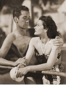Griffith Jones (as Charles Kent) and Margaret Lockwood (as Ann Markham) in a photograph from Look Before You Love (1948) (5)
