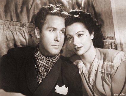 Griffith Jones (as Charles Kent) and Margaret Lockwood (as Ann Markham) in a photograph from Look Before You Love (1948) (6)