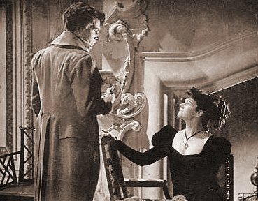 James Mason (as Marquis of Rohan) and Margaret Lockwood (as Hesther Shaw) in a photograph from The Man in Grey (1943) (4)