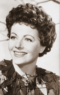 British actress Margaret Lockwood in Peter Pan, 1957.  Autograph reads ‘With Best Wishes, Margaret Lockwood’.