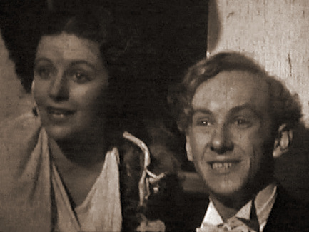 Margaret Lockwood (as Margaret Williams) and Hughie Green (as Hughie Hawkins) in a screenshot from Melody and Romance (1937) (1)