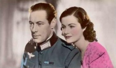 Rex Harrison (as Gus Bennett) and Margaret Lockwood (as Anna Bomasch) in a colourised photograph from Night Train to Munich (1940) (14)