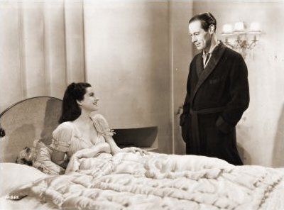 Margaret Lockwood (as Anna Bomasch) and Rex Harrison (as Gus Bennett) in a photograph from Night Train to Munich (1940) (5)