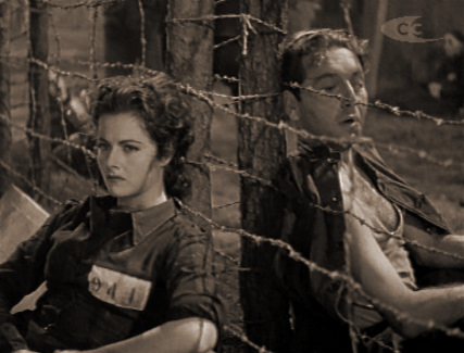 Margaret Lockwood (as Anna Bomasch) and Paul Henreid (as Karl Marsen) in a screenshot from Night Train to Munich (1940) (1)
