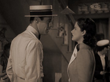 Rex Harrison (as Gus Bennett) and Margaret Lockwood (as Anna Bomasch) in a screenshot from Night Train to Munich (1940) (2)
