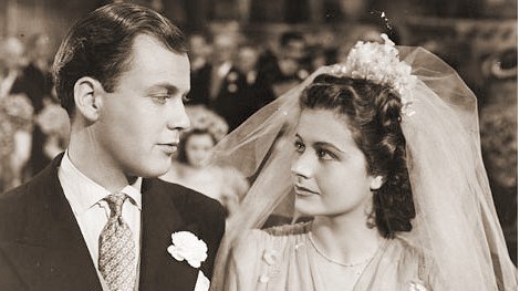 Derek Farr (as Dallas Chaytor) and Margaret Lockwood (as Janet Royd) in a photograph from Quiet Wedding (1941) (1)
