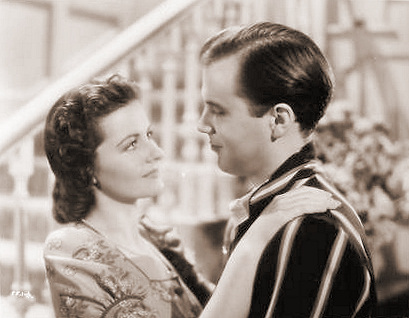 Margaret Lockwood (as Janet Royd) and Derek Farr (as Dallas Chaytor) in a photograph from Quiet Wedding (1941) (5)