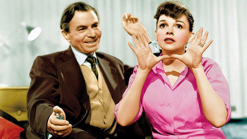 Norman Maine (James Mason) and Vicki Lester (Judy Garland) in a scene from the 1954 film, A Star is Born
