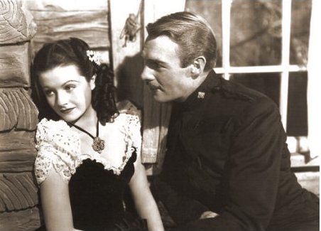 Margaret Lockwood (as Vicky Standing) and Randolph Scott (as Inspector Angus ‘Monty’ Montague) in a photograph from Susannah of the Mounties (1939) (6)