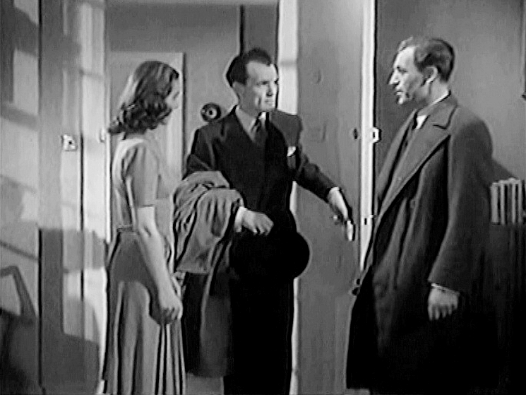 Screenshot from Suspected Person (1942) (2) featuring Clifford Evans and Patricia Roc