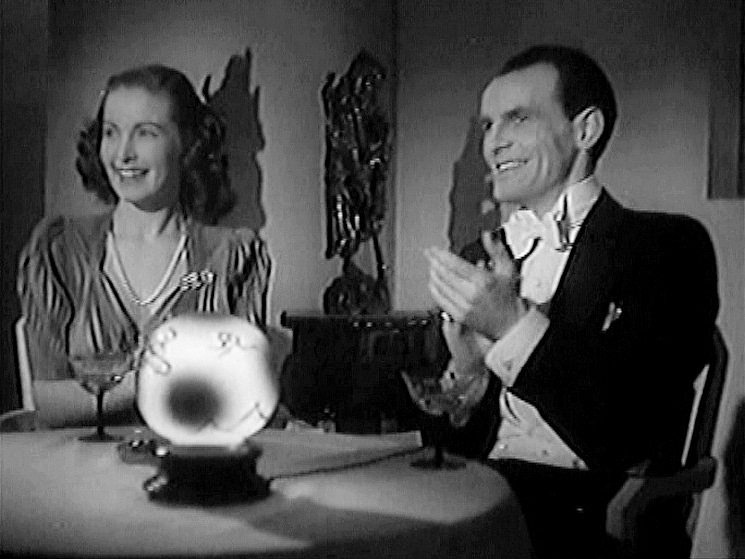 Screenshot from Suspected Person (1942) (3) featuring Patricia Roc and Clifford Evans
