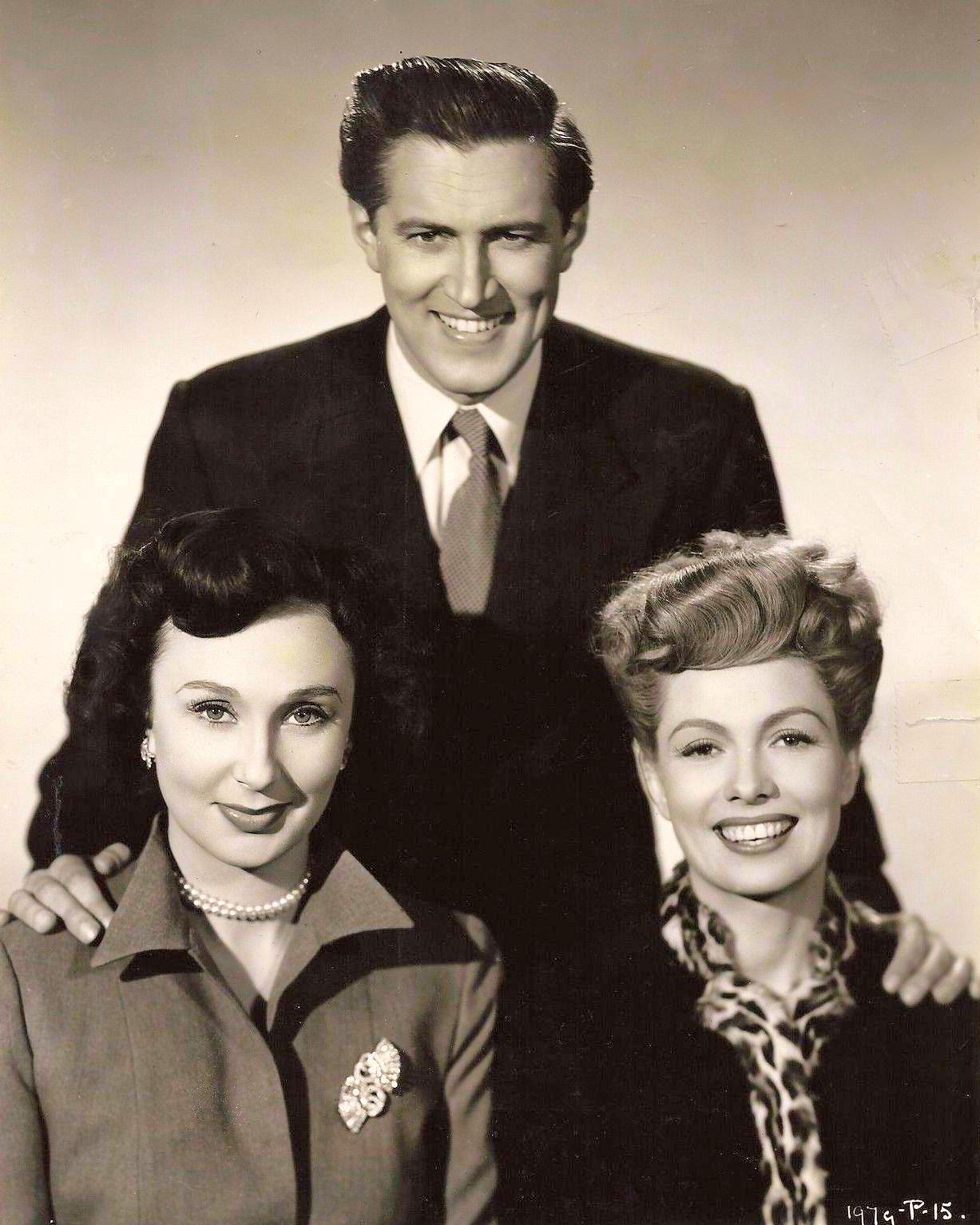 Photograph from Traveller’s Joy (1950) (1) featuring Googie Withers, John McCallum and Yolande Donlan