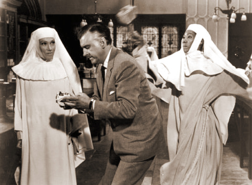 Cooper-Smith (Stewart Granger), holding the gold-filled piece of pottery, is knocked out by a bogus nun (Richardina Jackson).    Before he can be killed, however, shots ring out and the fake nunnery erupts, explosively.