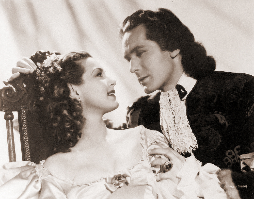 Patricia Roc (as Caroline) and Griffith Jones (as Sir Ralph Skelton) in a photograph from The Wicked Lady (1945) (45)