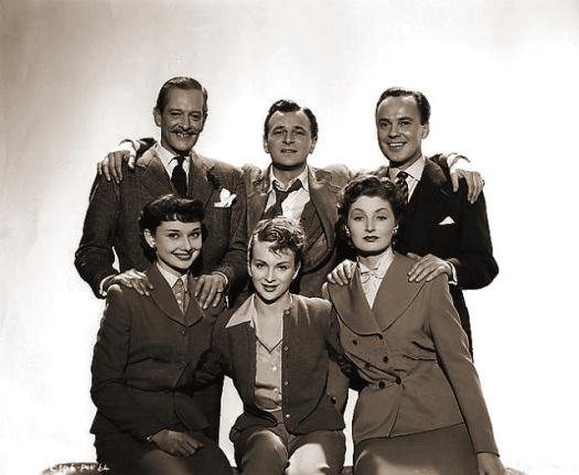 Guy Middleton (as Victor Manifold), Nigel Patrick (as Rodney Pennant), Derek Farr (as Bruce Banning), Audrey Hepburn (as Eve Lester), Joan Greenwood (as Sabina Pennant) and Helen Cherry (as Mary Banning) in a photograph from Young Wives’ Tale (1951) (3)